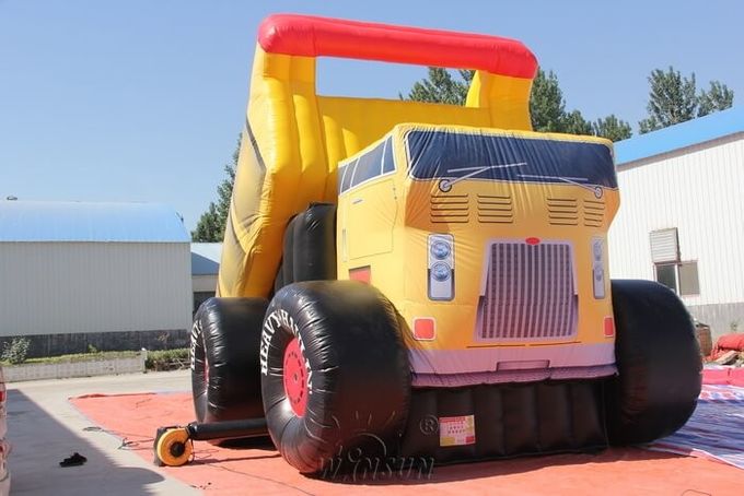 Forma pesada del camión volquete de las diapositivas inflables de los niños materiales del PVC con los equipos de reparación